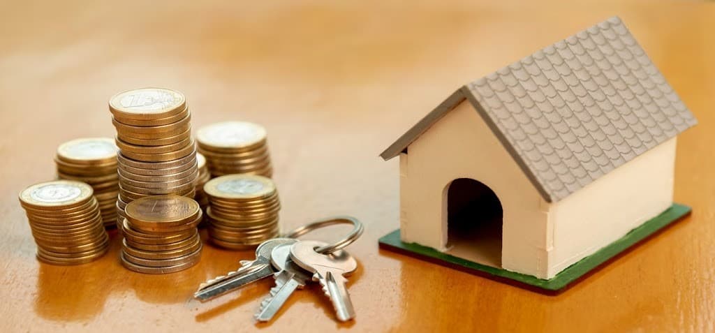 brown home with keys